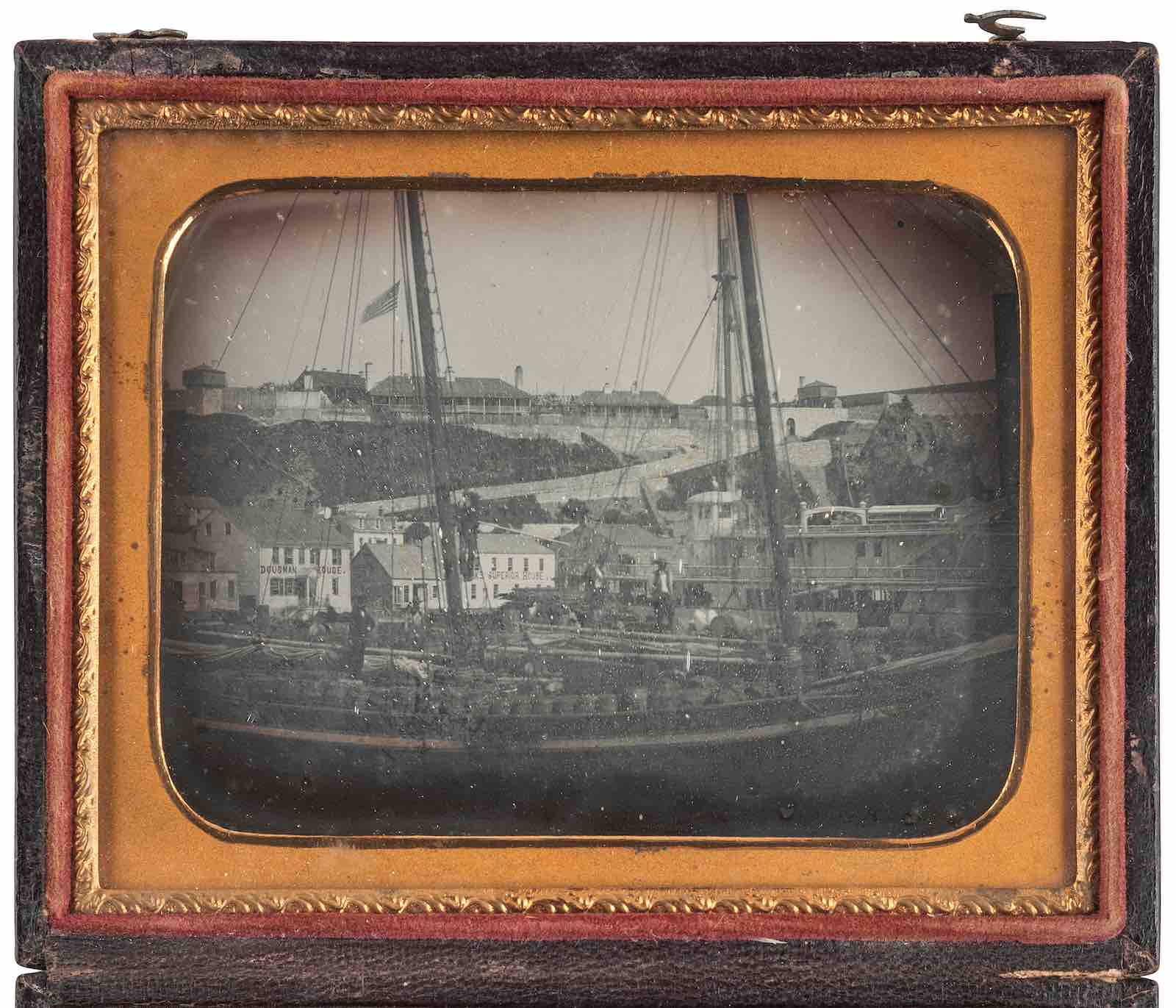 Lot 282: Quarter plate daguerreotype, possibly the earliest known photograph of Fort Mackinac, Michigan. Ca 1855 or later
