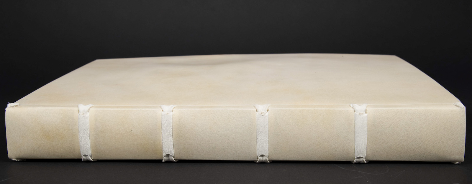 the spine and binding of the “Geographia” after conservation treatment