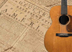 One of The Huntington’s annotated July 1776 printings of the Declaration of Independence and a 1936 acoustic guitar owned by Woody Guthrie
