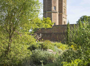 A view of Vita Sackville-West's historic Writng Tower from the completed Delos garden