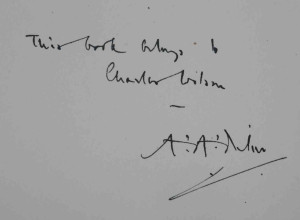 The copy of Winnie-the-Pooh inscribed by Milne on the front free endpaper