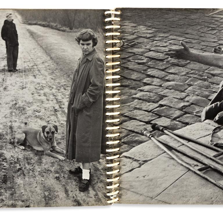 Handmade personal album of 27 Parisian silver prints by Ed van der Elsken